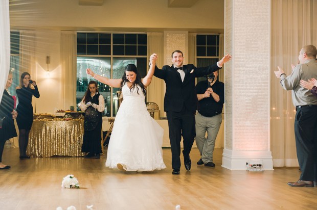 Danielle and Dan's gold and cranberry wedding has perfect clouds and lots of glittering gold