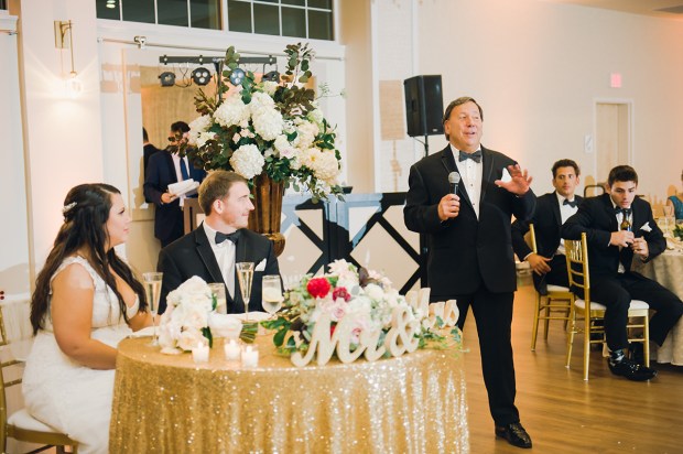 Danielle and Dan's gold and cranberry wedding has perfect clouds and lots of glittering gold