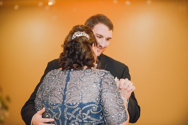 Danielle and Dan's gold and cranberry wedding has perfect clouds and lots of glittering gold